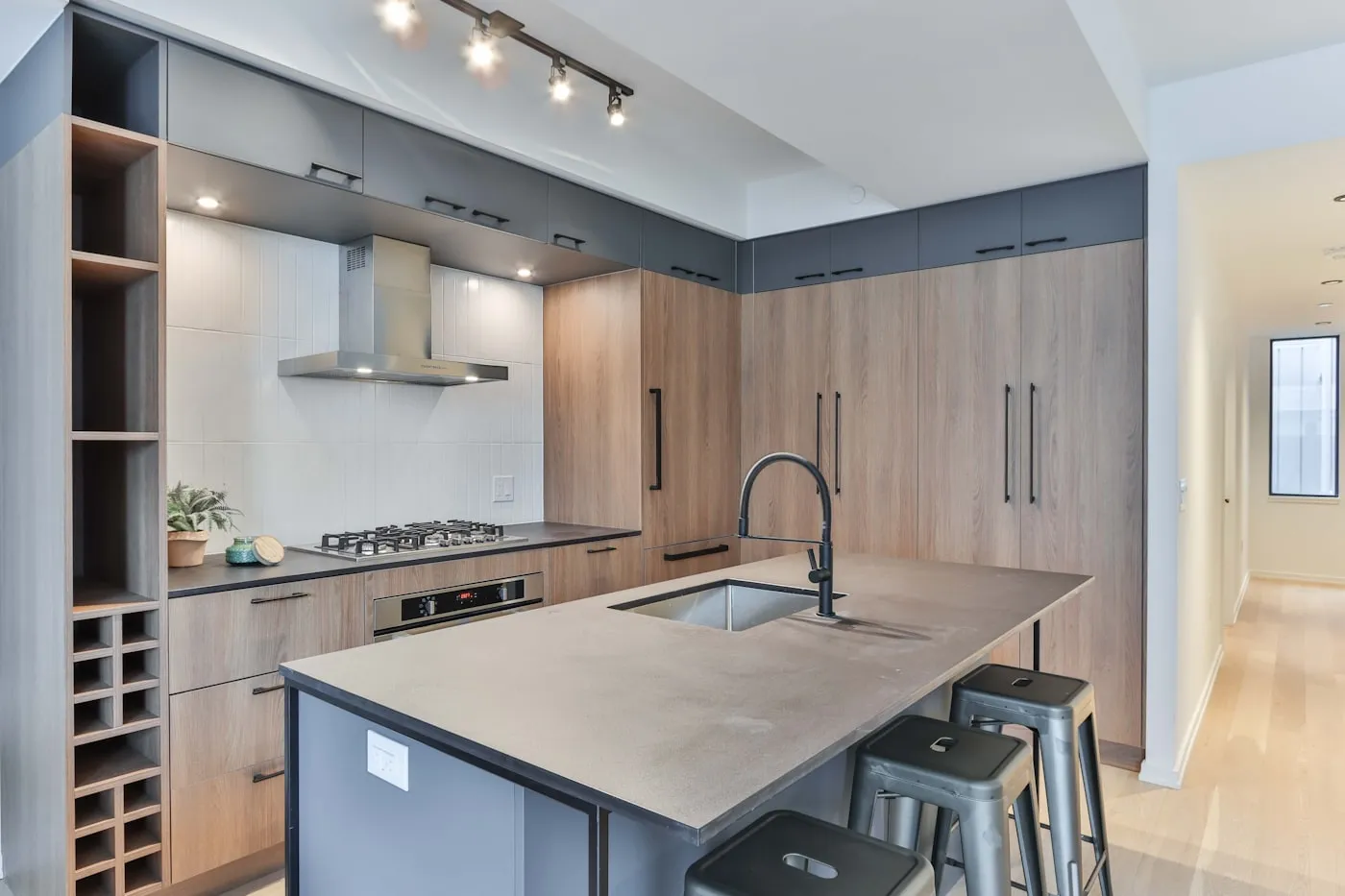 Modern kitchen with stone waterfall island